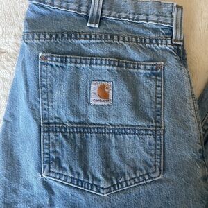 Vintage Carhartt Relaxed Blue Jeans Classic Denim Style with paint splatter